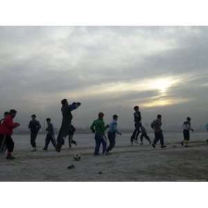  Afghan Youths Warm up Themselves Before a Soccer Match 