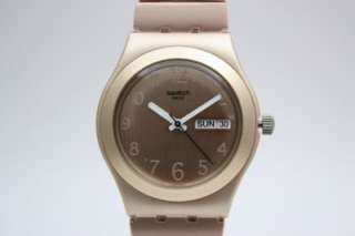 New Swatch Irony Silky Lustre Aluminum Rose Gold Tone Women Date Watch 