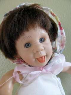 Baby Doll with Sticking Out Tongue  