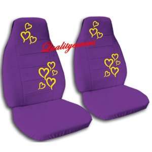  2 purple front seat covers with yellow hearts. 2002 Mini 
