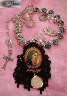 This is the necklace I created in honor of Jesus with relic medal and 