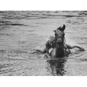 Sydney Hoyle Floundering on Back of Horse in Water at Full Cry Farm 