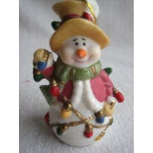 Snowman Ornament with Scarf and Red Coat, holding Christmas Tree 