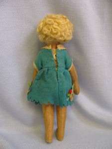 in cute dresses and curly blonde hair like this well loved little doll 