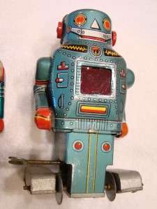 pair of vintage tin toys, wind up mechanical Mighty Robots, circa 