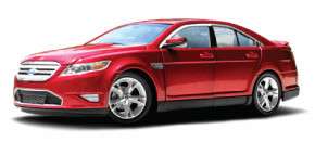 GREENLIGHT COLLECTIBLES 124 SCALE RED 2010 FORD TAURUS SHO  