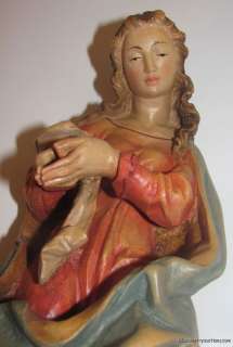 Baby Jesus nestles into the Dress of Mary, shown below for example and 