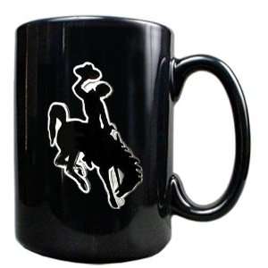 Wyoming Cowboys 15 Ounce Black Ceramic Mug:  Sports 