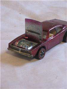 Here is a vintage 1968 Hot Wheels Custom Dodge Charger with magenta 