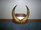   PAIR OF POLISHED BULL COW STEER HORNS. MOUNTED ON WOOD PLAQUE