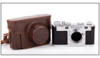 Mint  Nikon S rangefinder film camera in silver w/leather case 