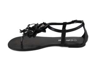 PU material. T strap thong sandal with side ankle buckle. A beautiful 