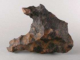 Canyon Diablo iron meteorite fragment (IAB) 2,641 grams. Note colorful 