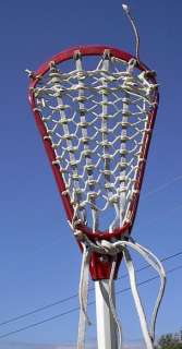  lacrosse stick. Measures 43 long. Signed BRINE. The lacrosse 